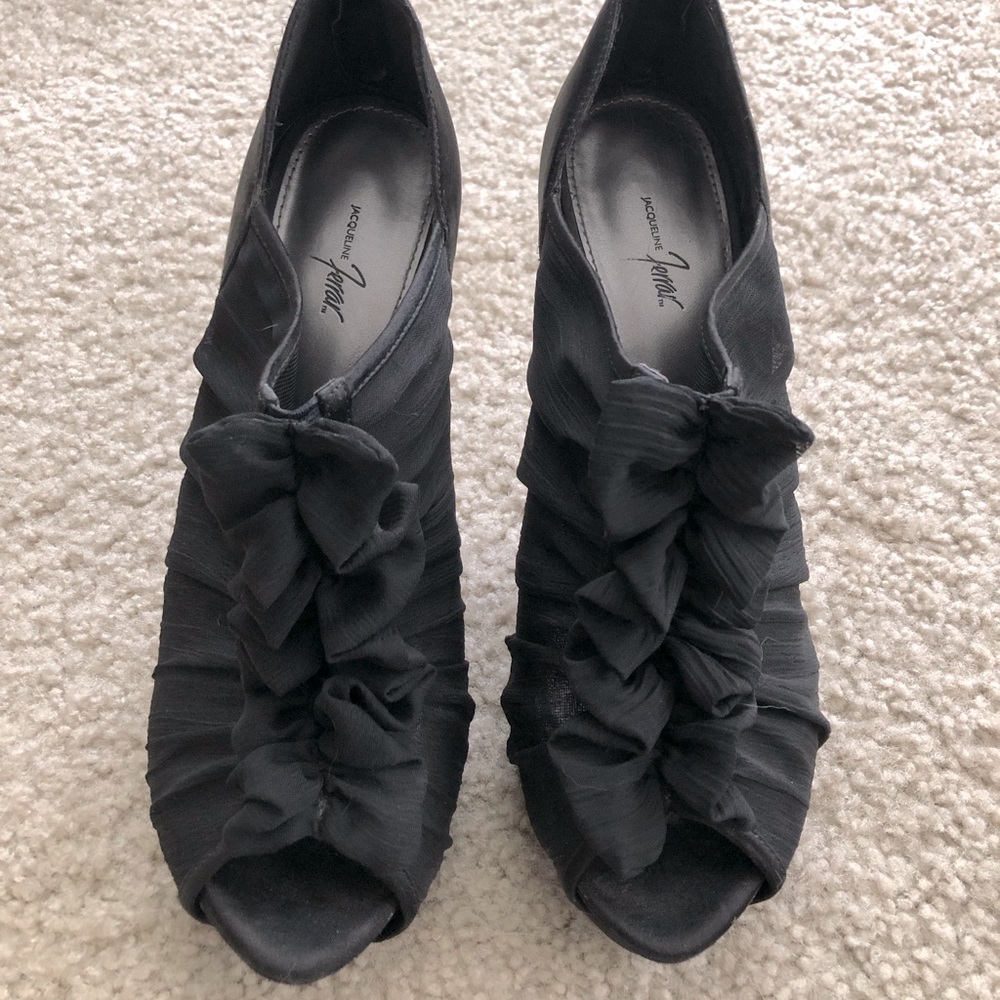 Black ruffle heels